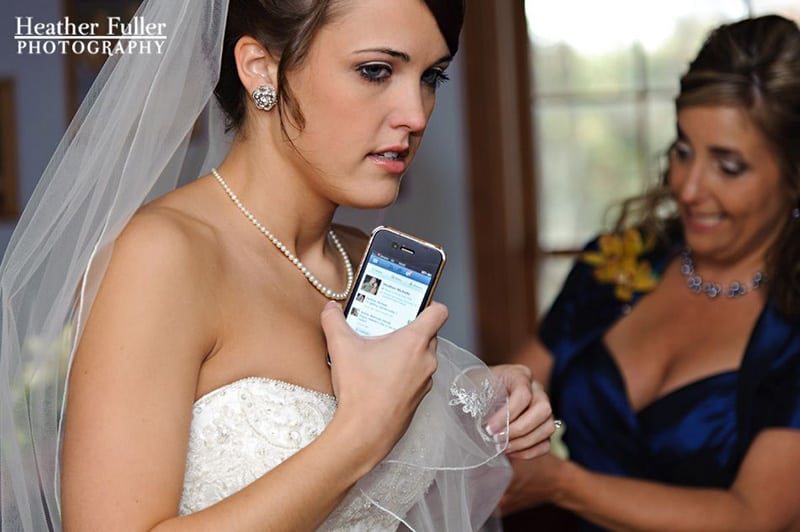 bride-updating-facebook-status-wedding-day