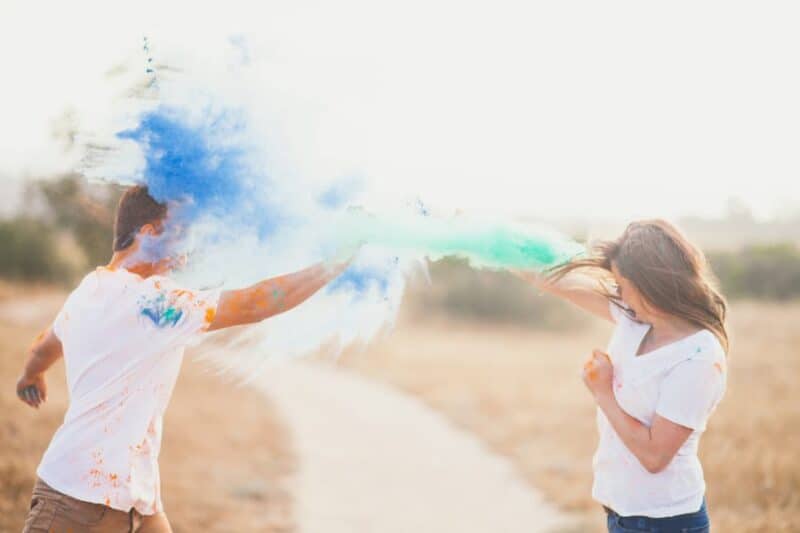 A Fun Paint Throwing Engagement Shoot! Colourful Engagement Shoot on