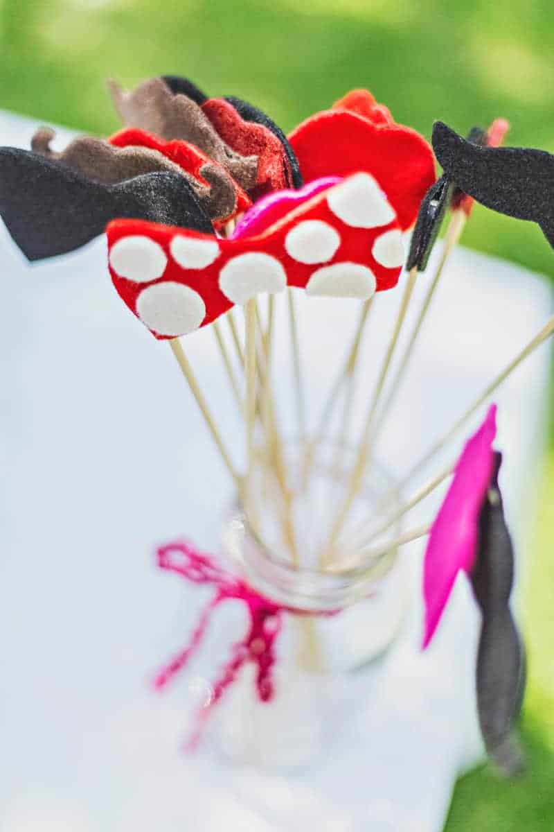 DIY photobooth props bows and mustaches wedding