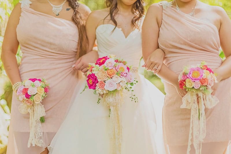 Pastel Bridesmaids with Pink bouquets