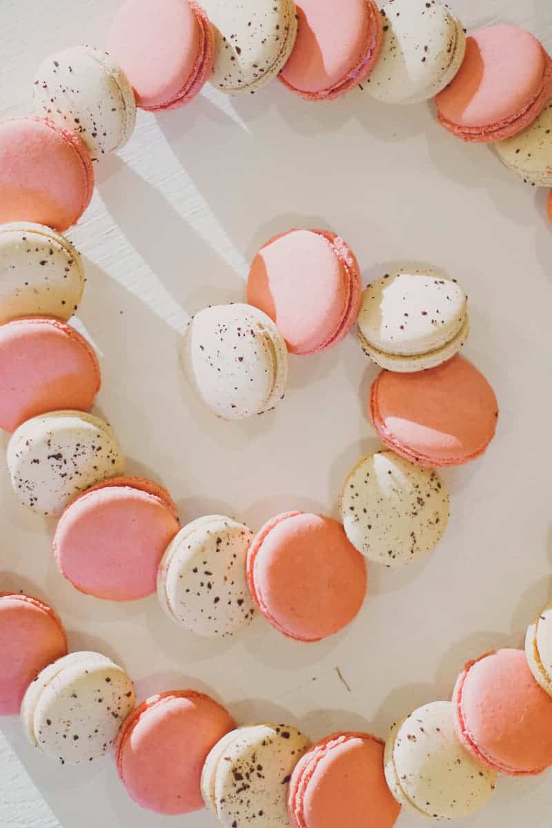 Pink and white macaroons macarons on dessert table romantic whimsical