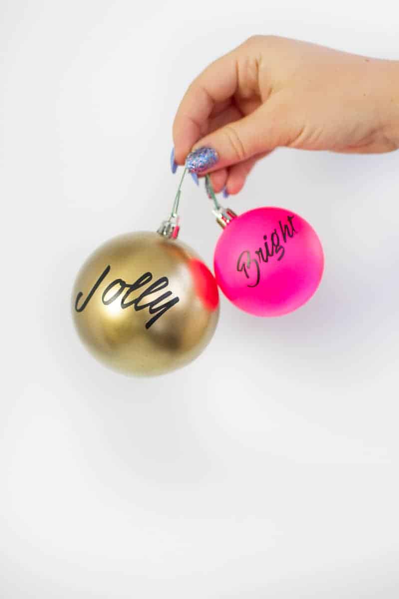 How to decorate your own baubles christmas DIY tutorial cricut paint splattered vinyl typography quotes colour blocked colourful modern bright jolly merry