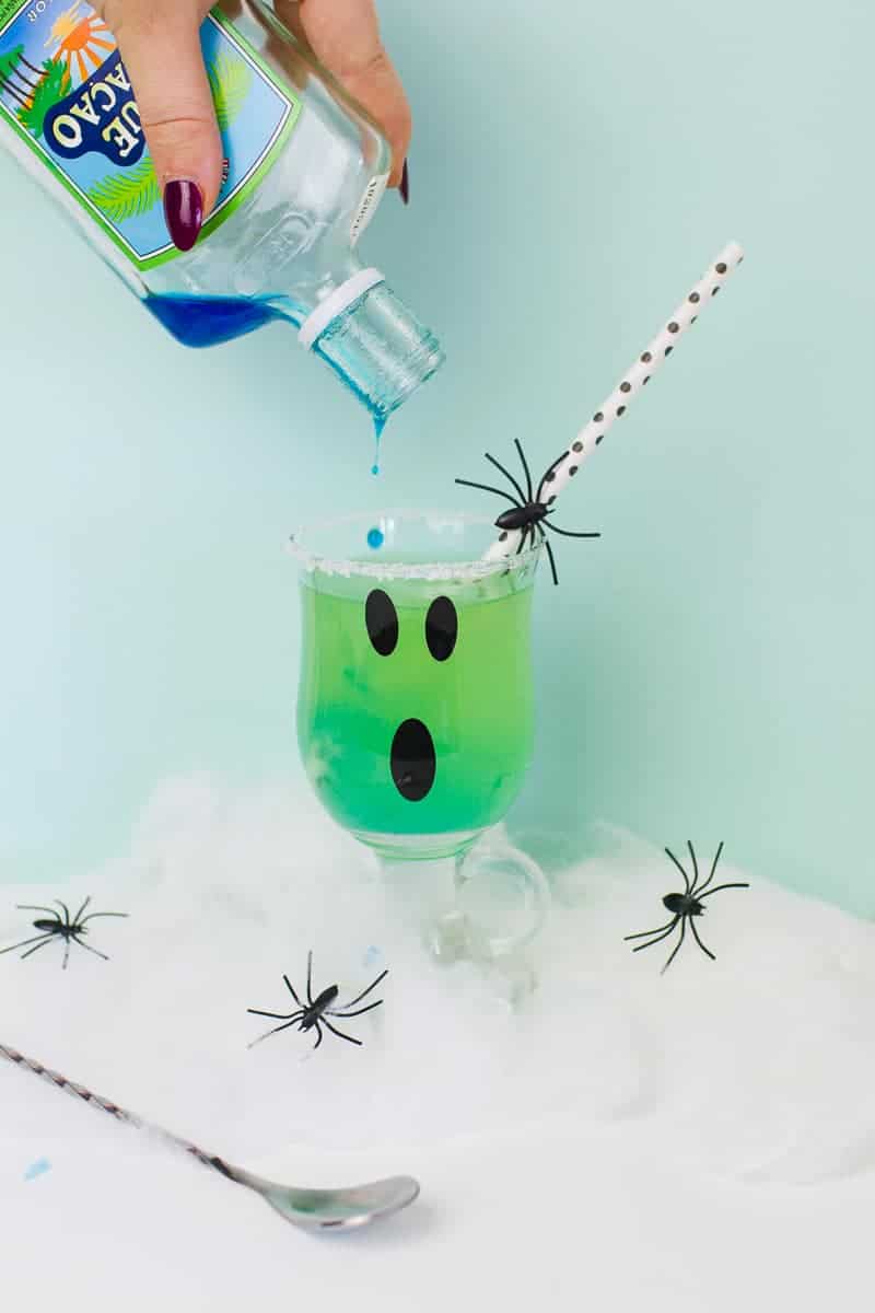 green-halloween-cocktail-recipe-rum-curacao-apple-sours-fun-ghost-spooky-ombre-blue-6