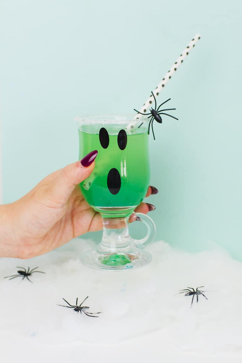 green-halloween-cocktail-recipe-rum-curacao-apple-sours-fun-ghost-spooky-ombre-blue-9