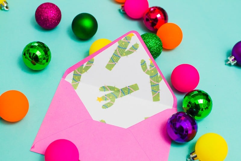 Get Creative This Christmas With These Free Printable Envelope Liners christmas-envelope-liners-free-printable-download-festive-flamingo-cactus-lights-pink-fun-10