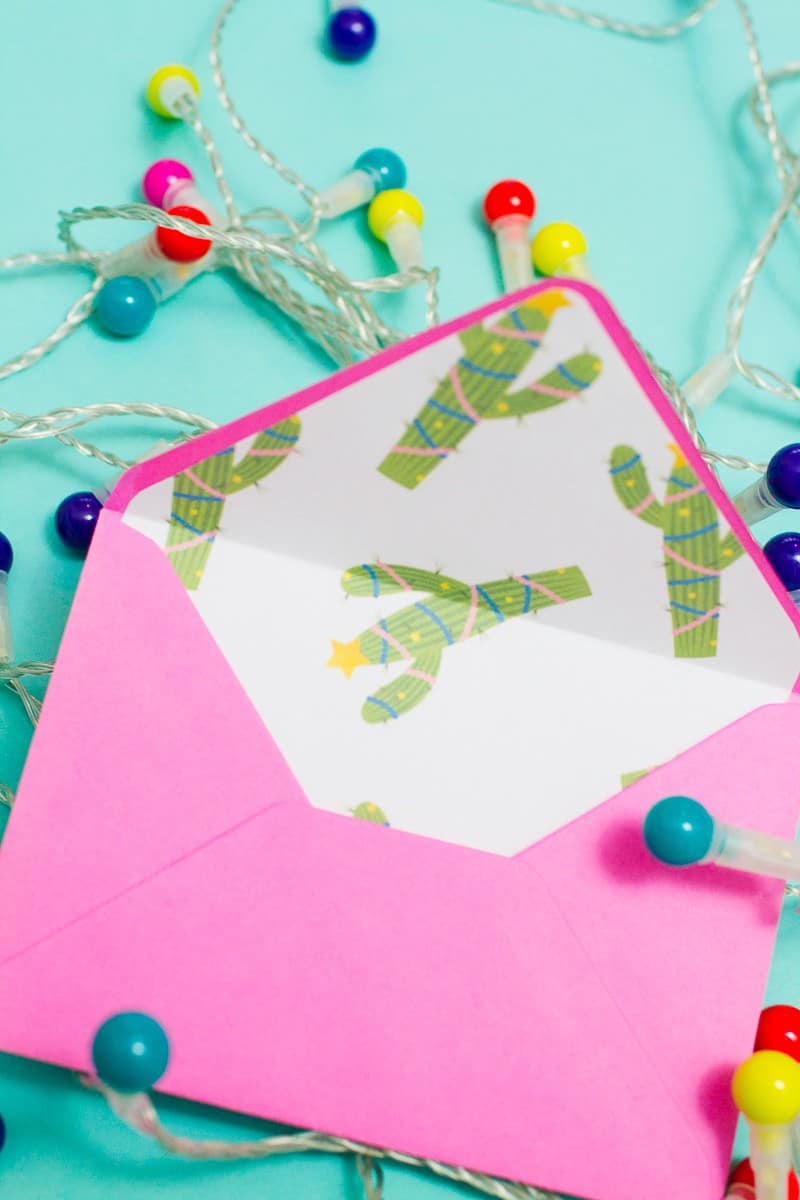 Get Creative This Christmas With These Free Printable Envelope Liners christmas-envelope-liners-free-printable-download-festive-flamingo-cactus-lights-pink-fun-9
