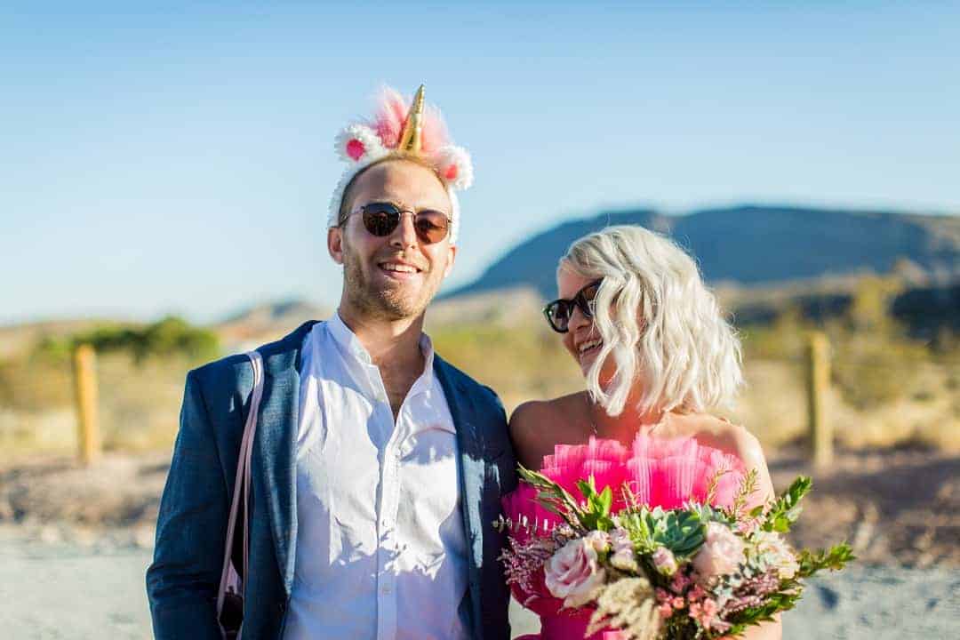 RED ROCK CANYON LAS VEGAS ELOPEMENT STARRING BRIDE IN SHORT PINK HIPSTER WEDDING DRESS 