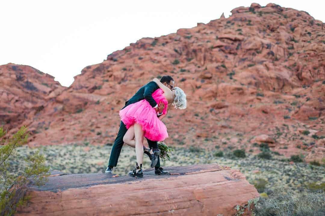 RED ROCK CANYON LAS VEGAS ELOPEMENT STARRING BRIDE IN SHORT PINK HIPSTER WEDDING DRESS