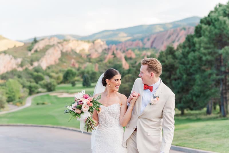 bride and groom shoot at golf course