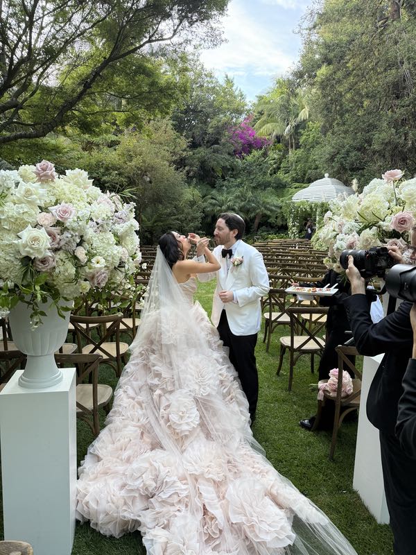 Christina and Ron enjoying a special wedding oyster
