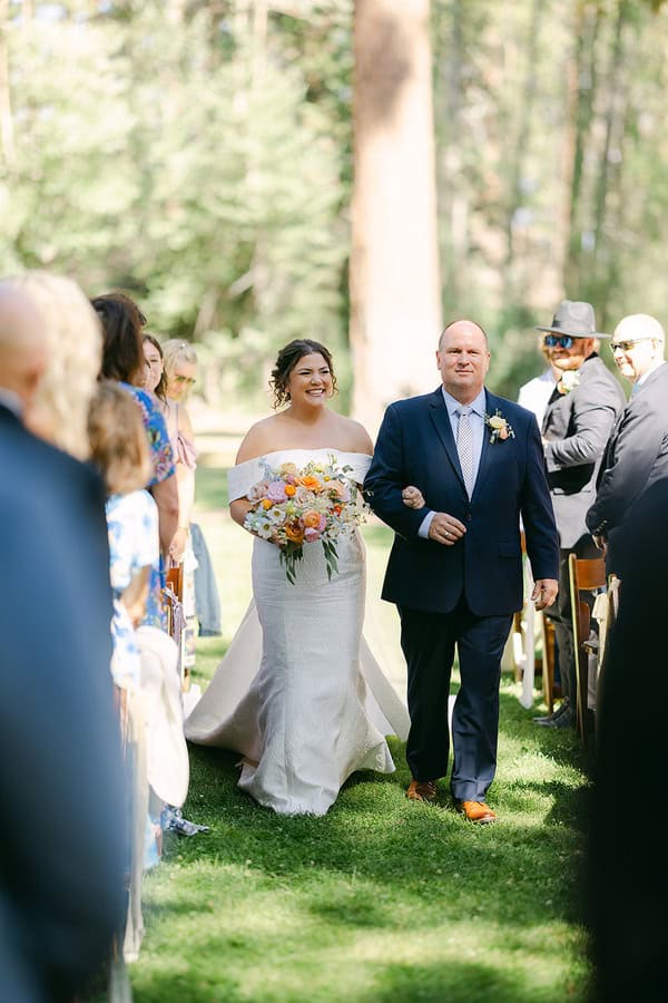 bride and her father walking up the isle at a Lakeside Wedding at Valhalla Tahoe 