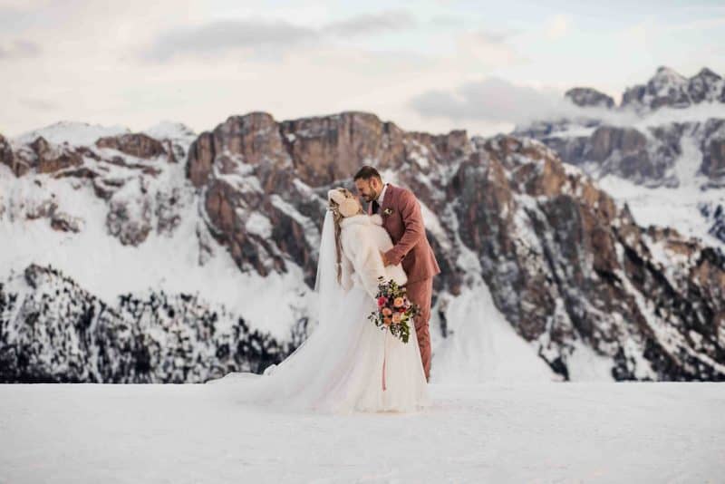 Helena & Keio's Dreamy Winter Vow Renewal In Italy: Snow, Pizza, And A Love Story 10 Years In The Making vow renewal in dolomites in italy