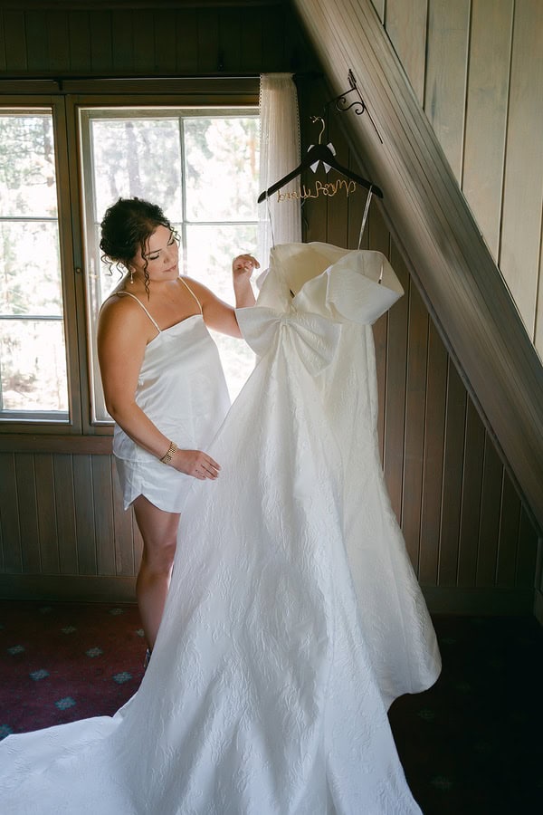 bride checking her wedding dress