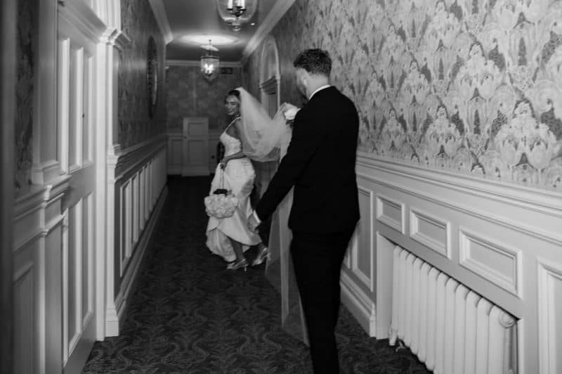 Lucy & Lewis's Romantic Bovey Castle Elopement (Plus Tips For Planning Your Own!) bride and groom in castle