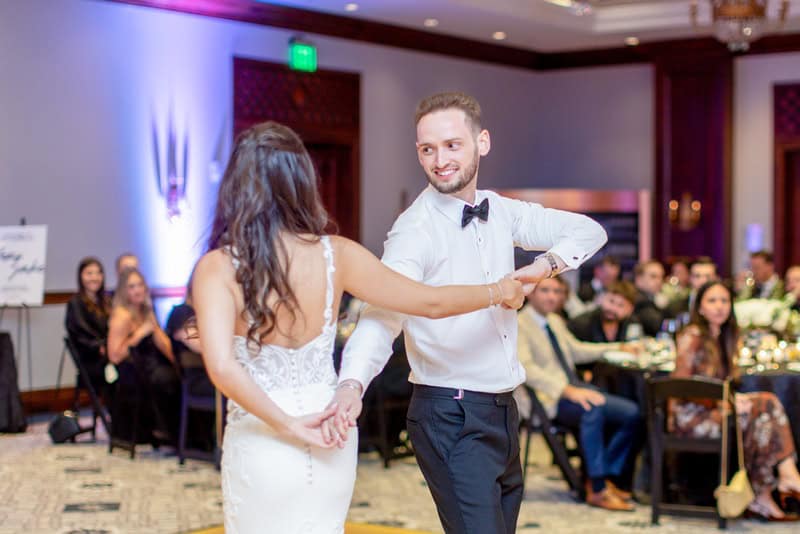 bride dancing with groom at Omni Montelucia Celebration at One of the Top Wedding Venues in Paradise Valley