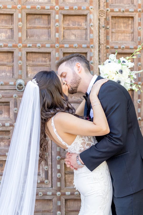 groom kissing the bride at Omni Montelucia wedding at One of the Top Wedding Venues in Paradise Valley