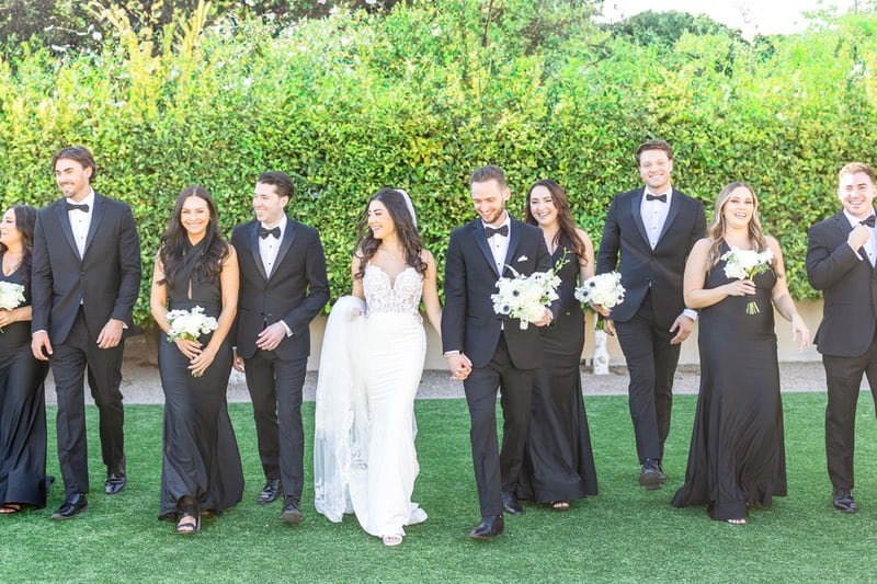 bride and groom with bridesmaids at Omni Montelucia Celebration at One of the Top Wedding Venues in Paradise Valley