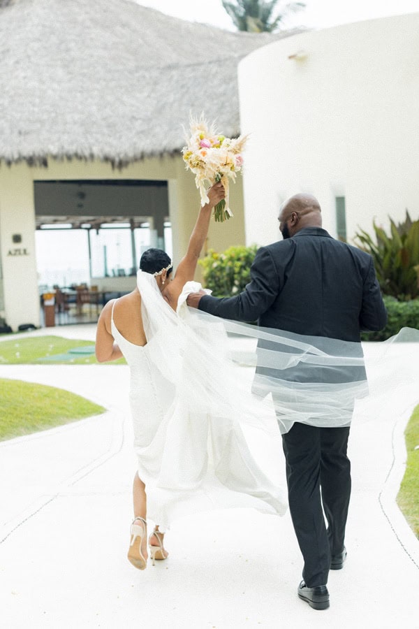 bride and groom at Celebration at One of Mexico Top Destination Wedding Resorts
