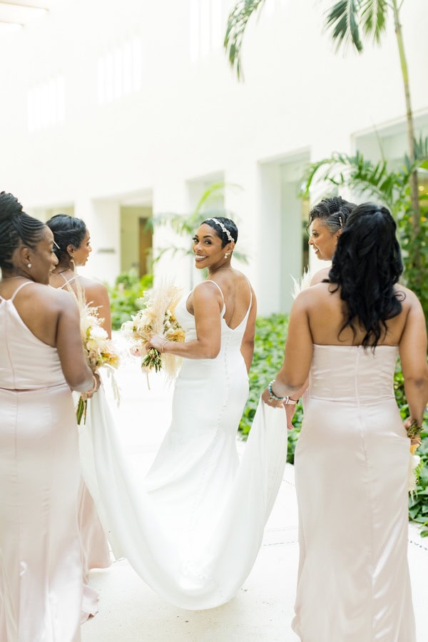 We LOVE this Glamorous Celebration at One of Mexico's Top Destination Wedding Resorts - Bride With Bridesmaids At Celebration At One Of Mexico Top Destination Wedding Resorts