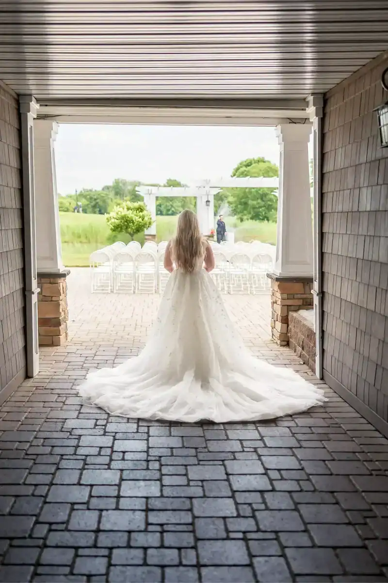 a bride walking at Traditions at the Links
