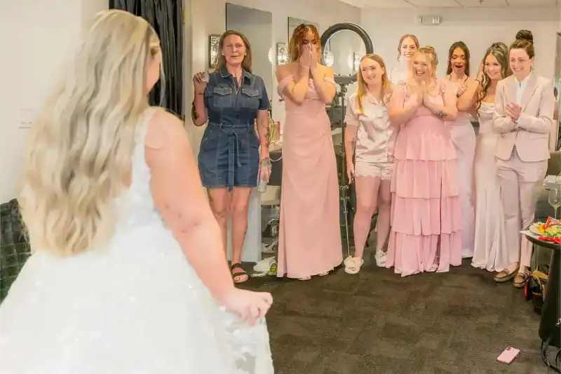 bride with the bridesmaids reaction