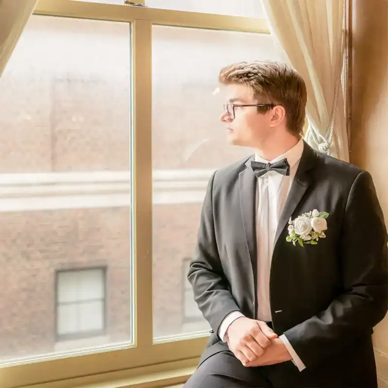 groom at wedding at Marriott hotel in syracuse NY