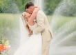the groom kisses the bride at syracuse wedding venue
