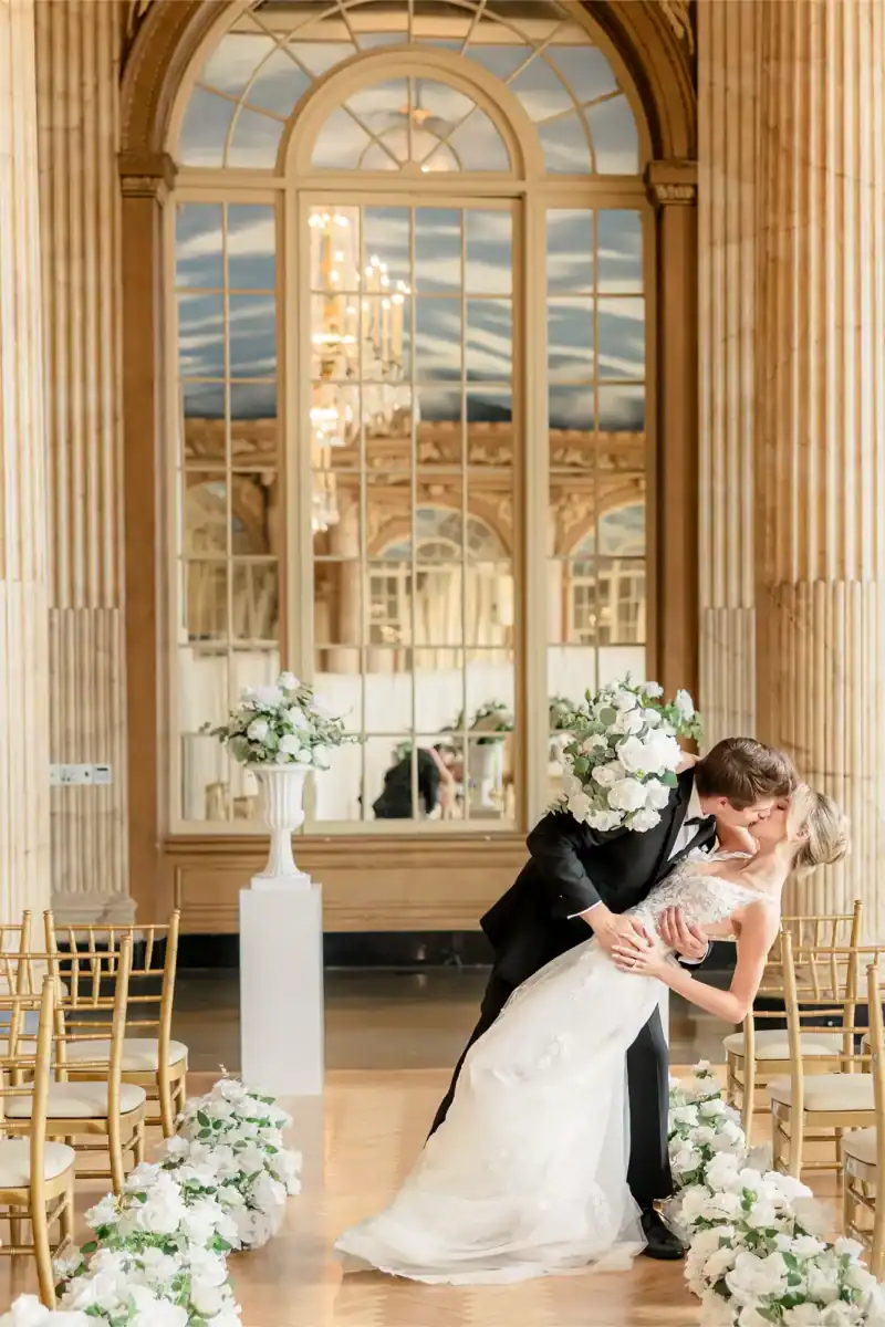 groom kissing the bride at Marriott Hotel Wedding in Syracuse photoshoot